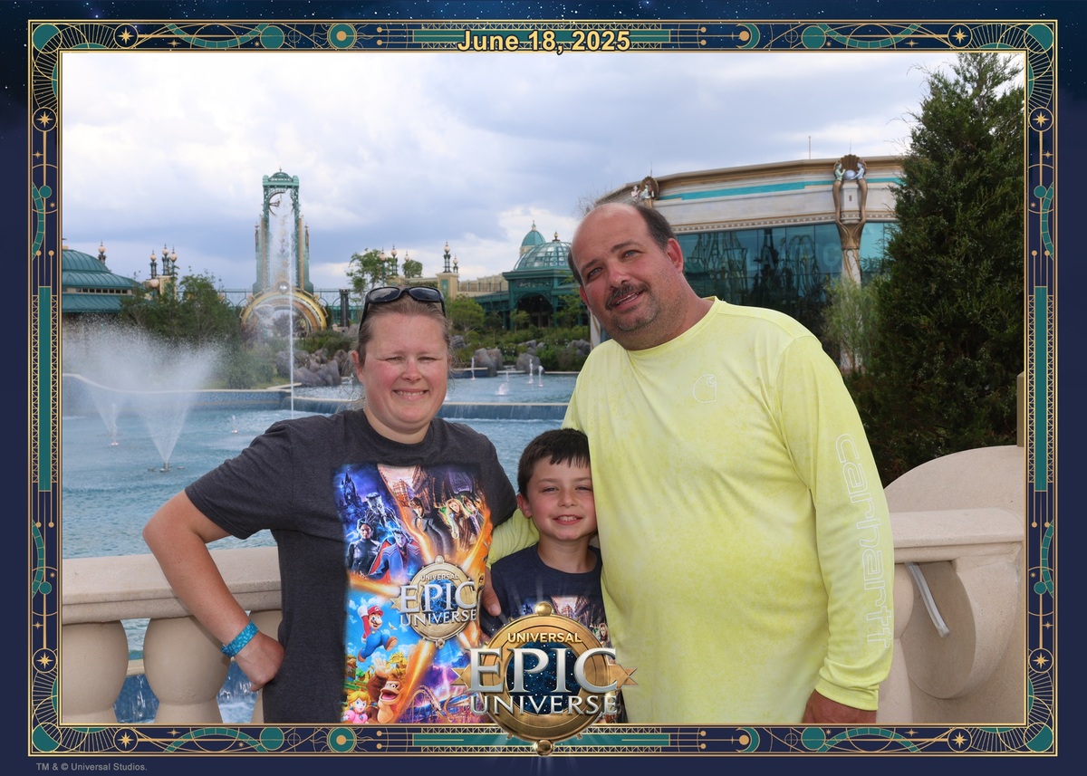 family of 3 smiling